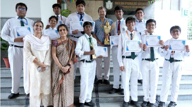 Quizzing Club, competition podiums and the rolling trophy.