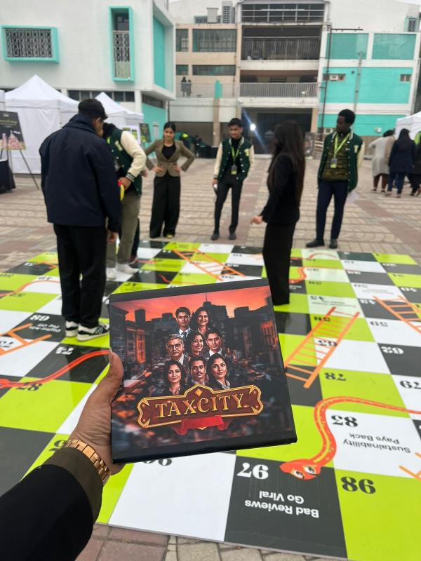TaxCity's life-size board at a school showcase, TETR Disrupt.